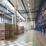 View of full warehouse with forklift